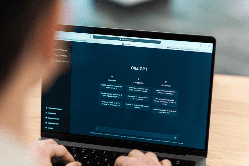 A laptop with the ChatGPT starting page on the screen